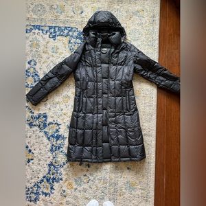 Black women’s NorthFace puffer jacket
